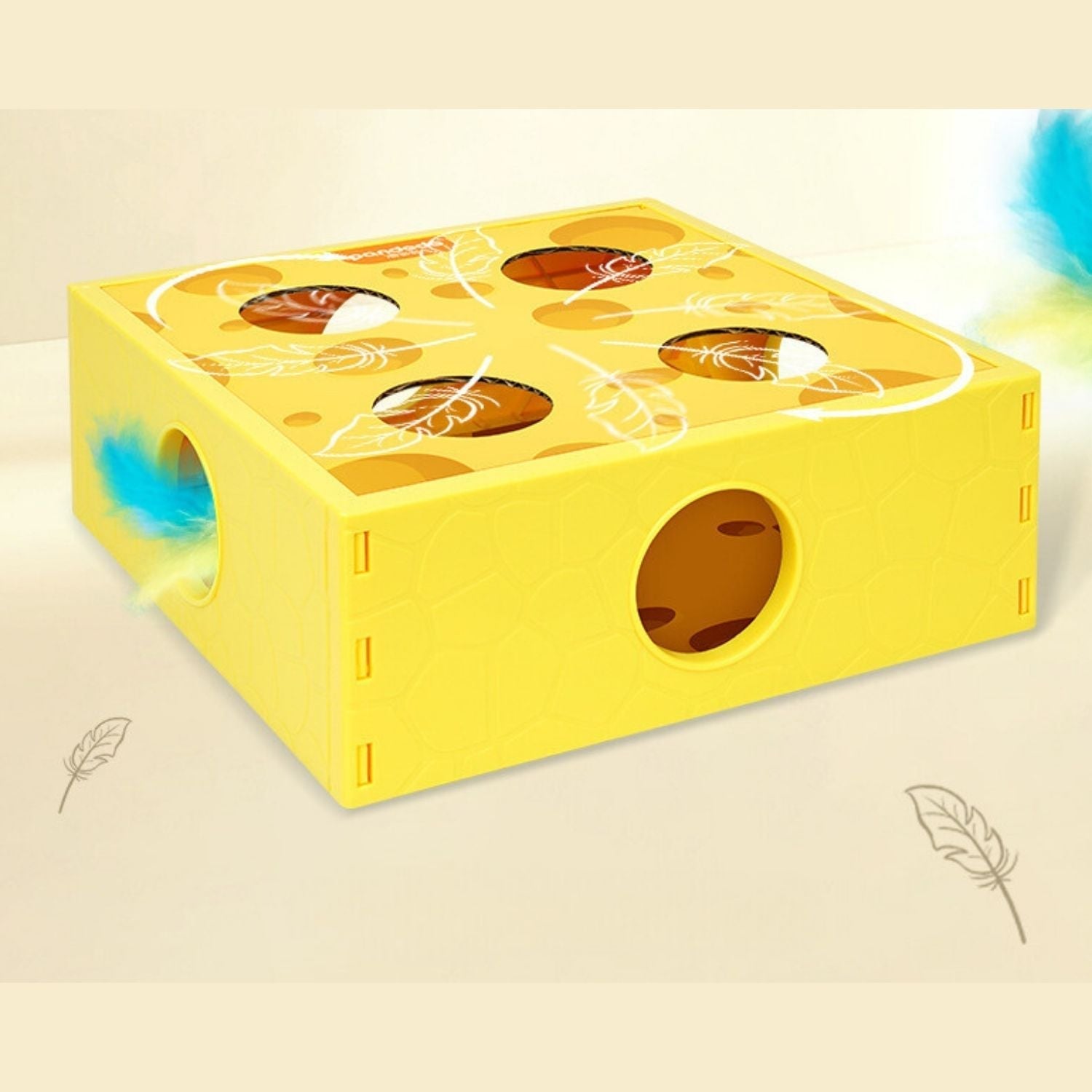 Kattenspeelgoed in de vorm van een kaasdoos met een draaiend veertje voor interactief spelen